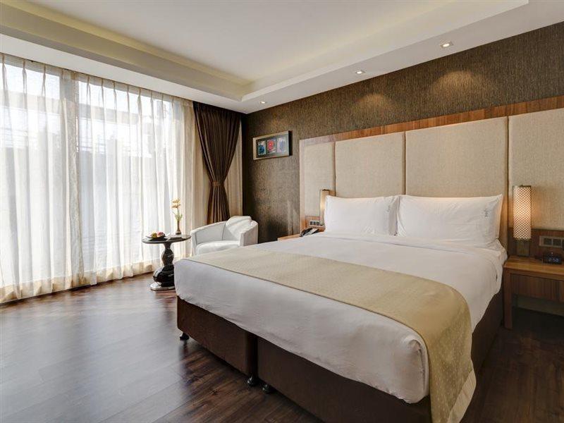 Holiday Inn Kolkata Airport By Ihg Esterno foto Deluxe Room
