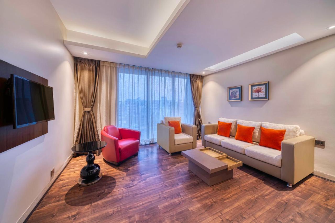 Holiday Inn Kolkata Airport By Ihg Esterno foto Living room