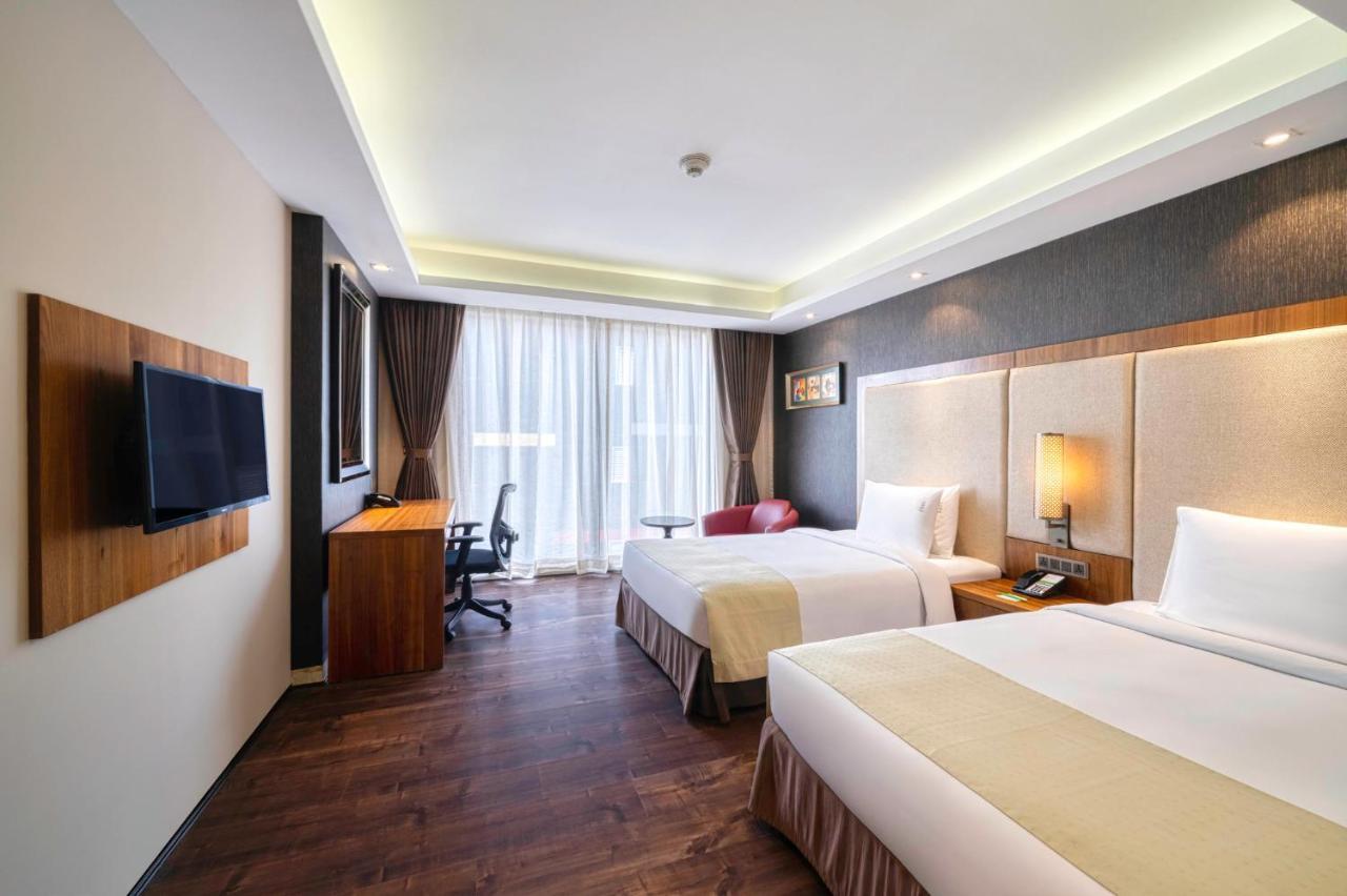 Holiday Inn Kolkata Airport By Ihg Esterno foto Deluxe Room